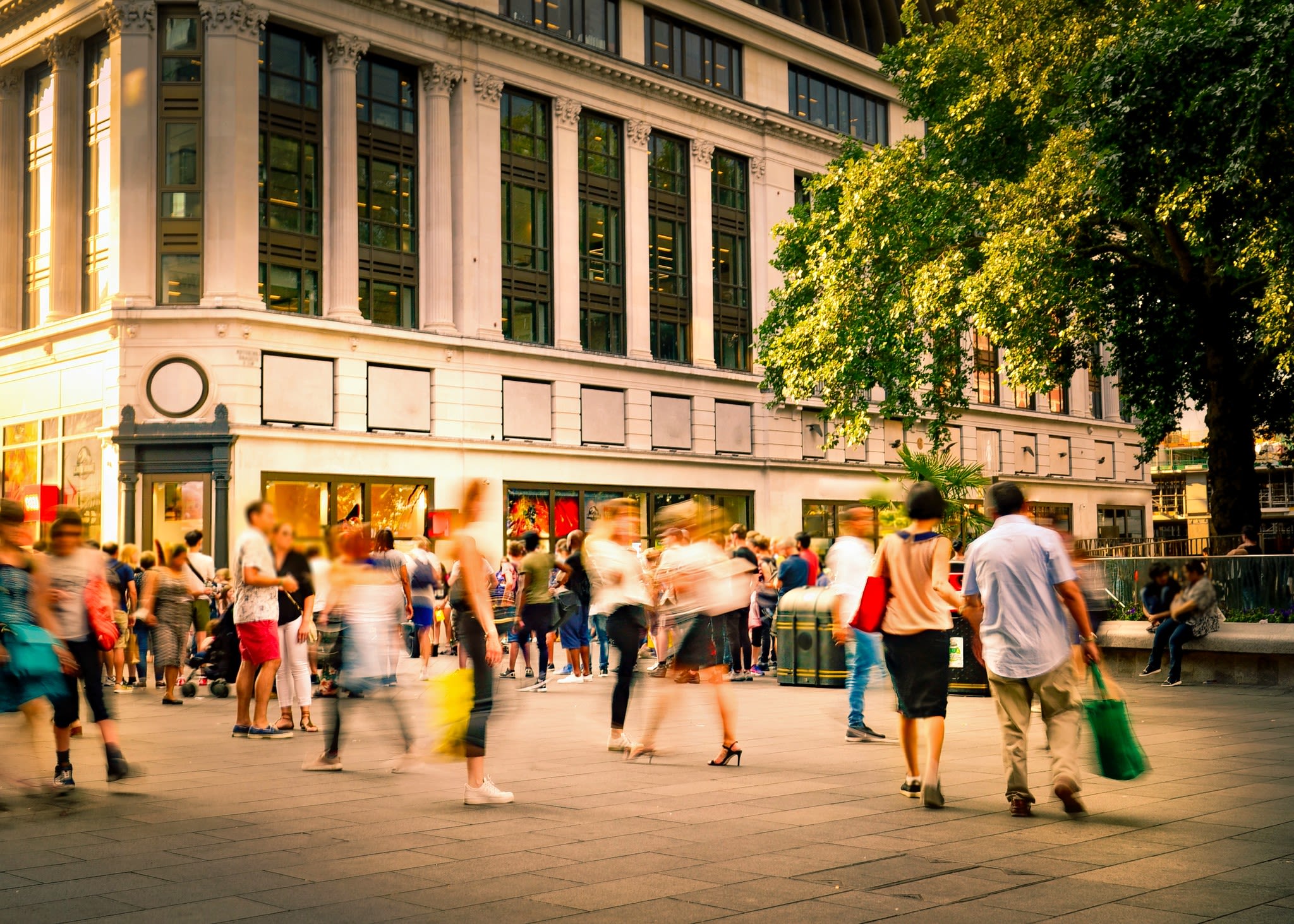 Colourful illustration of people with shopping bags in a store