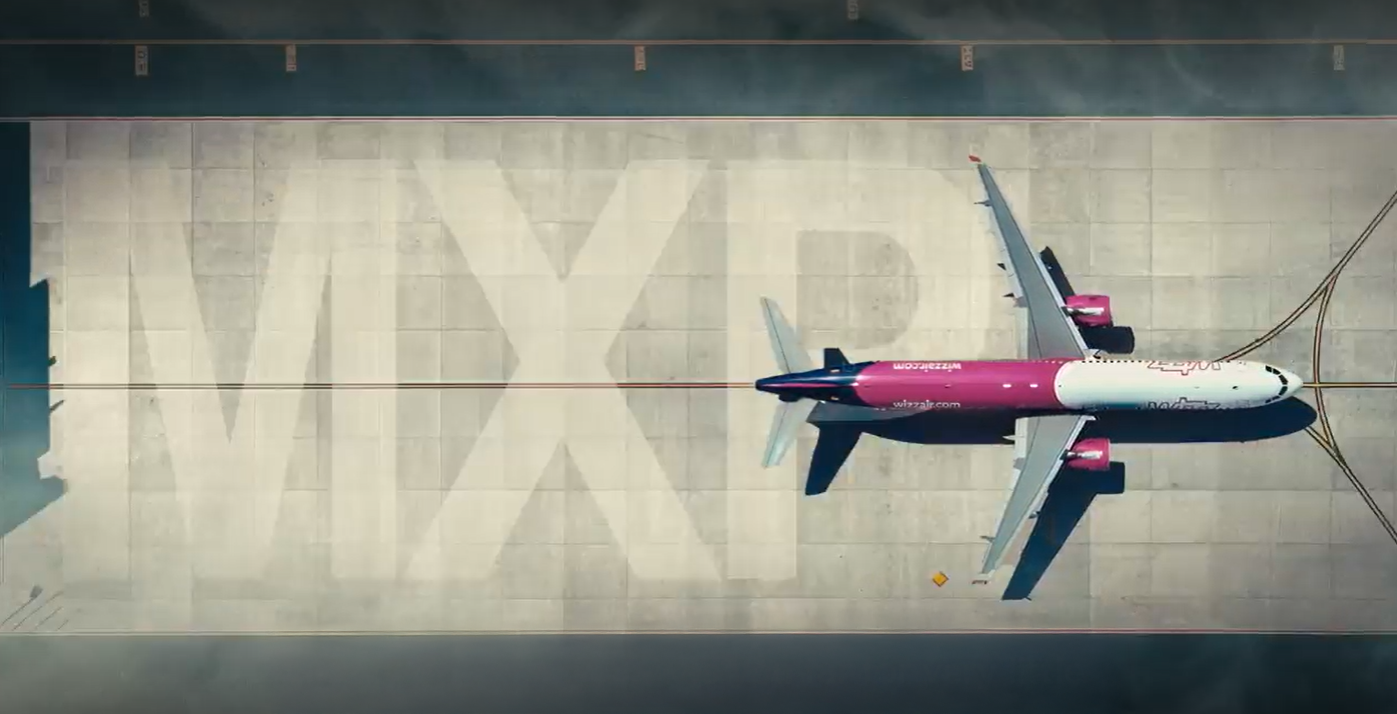 Plane on runway seen from above.