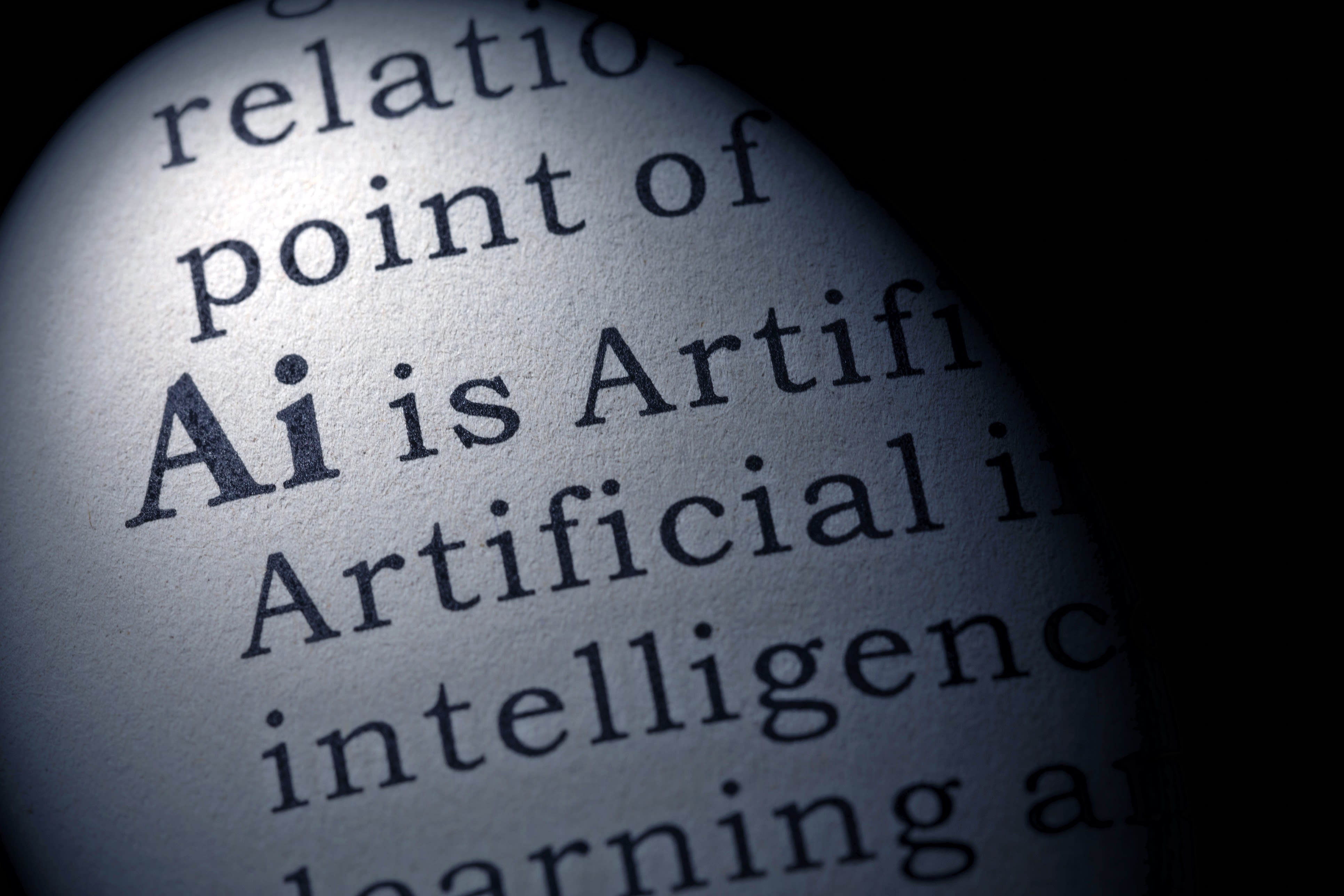 Page from a dictionary, showing definition of AI