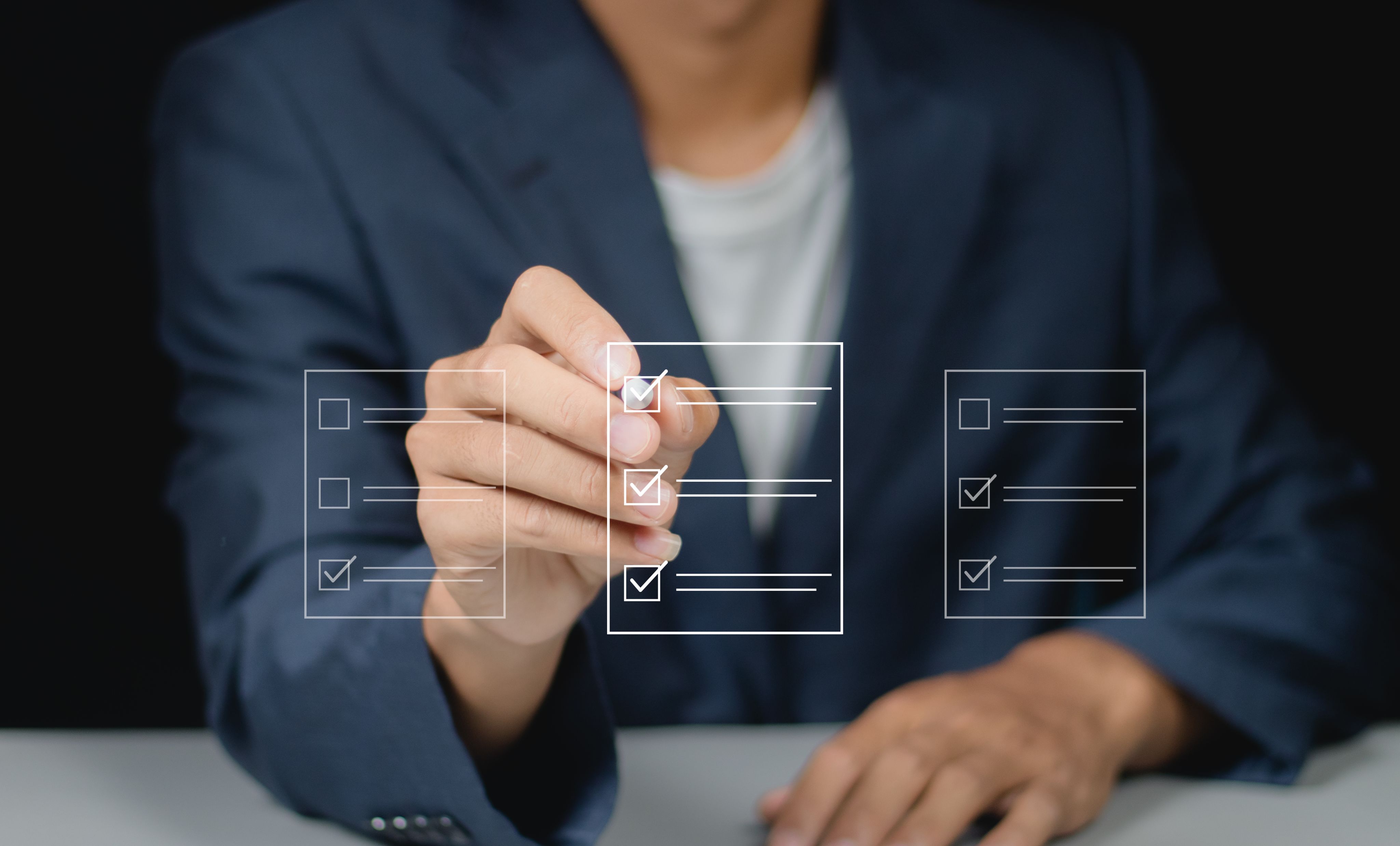 Person ticking items of a tick list in front of them